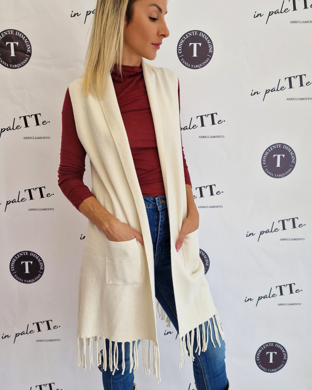 GILET BIANCO CON FRANGE in paleTTe. abbigliamento