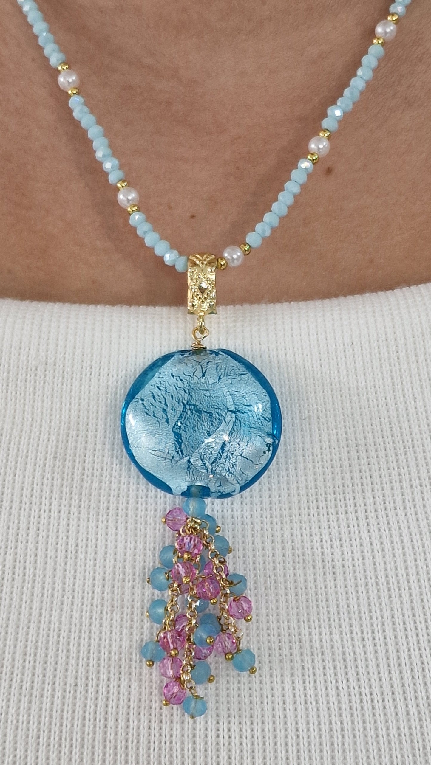COLLANA OCEANO DI LUCE in paleTTe. abbigliamento