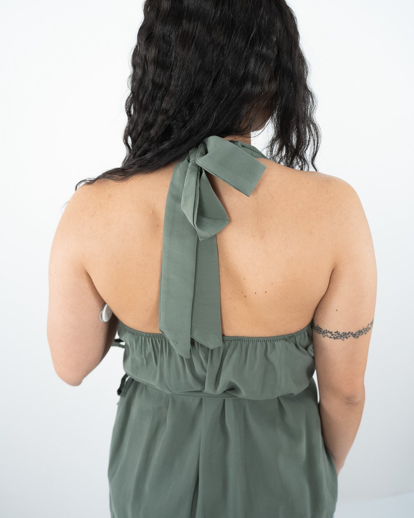 Top verde in paleTTe. abbigliamento