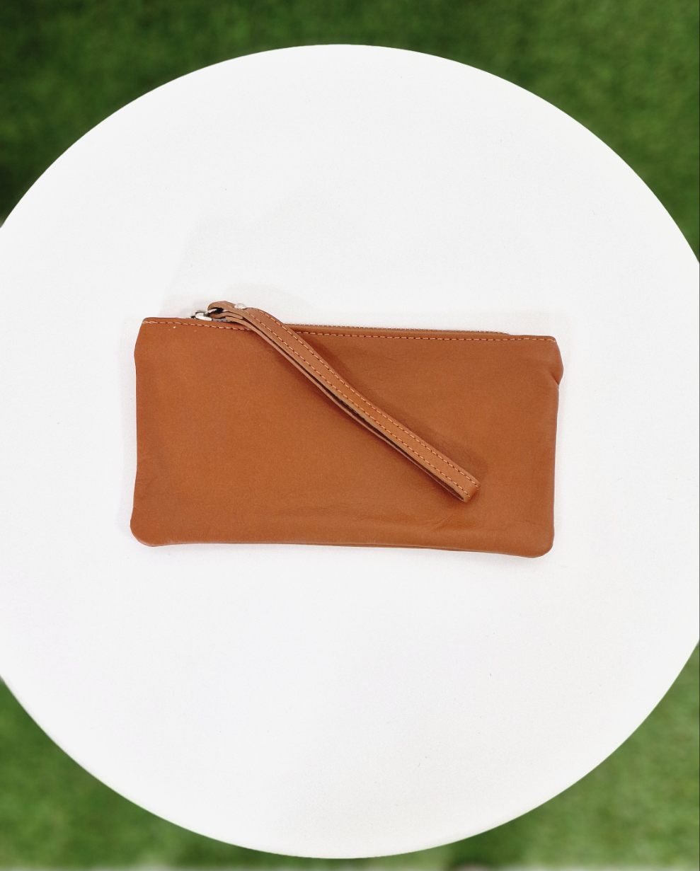 POCHETTE IN VERA PELLE - in paleTTe. abbigliamento