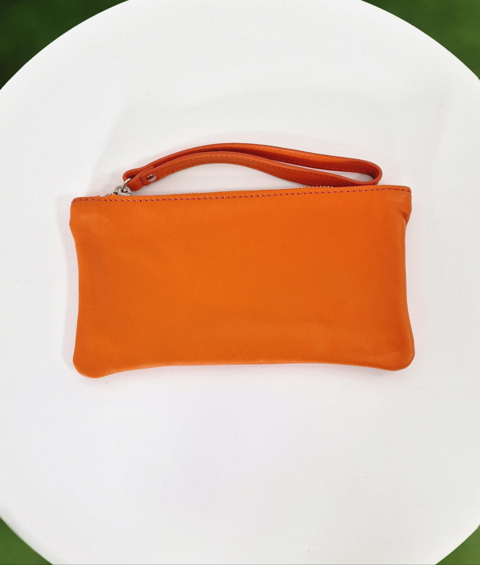 POCHETTE IN VERA PELLE - in paleTTe. abbigliamento