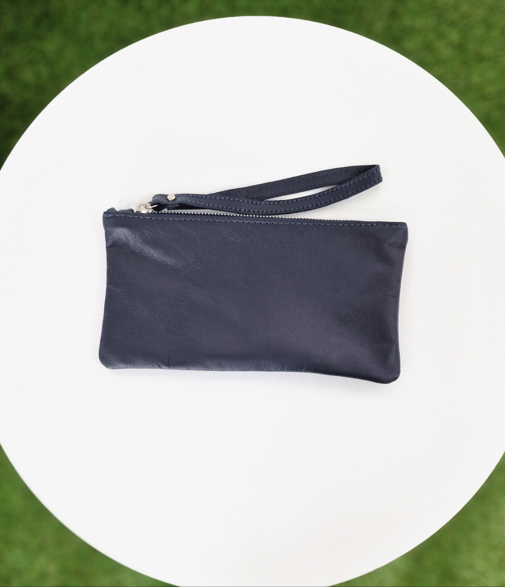 POCHETTE IN VERA PELLE - in paleTTe. abbigliamento