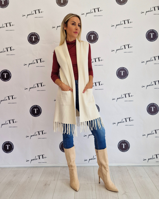 GILET BIANCO CON FRANGE in paleTTe. abbigliamento