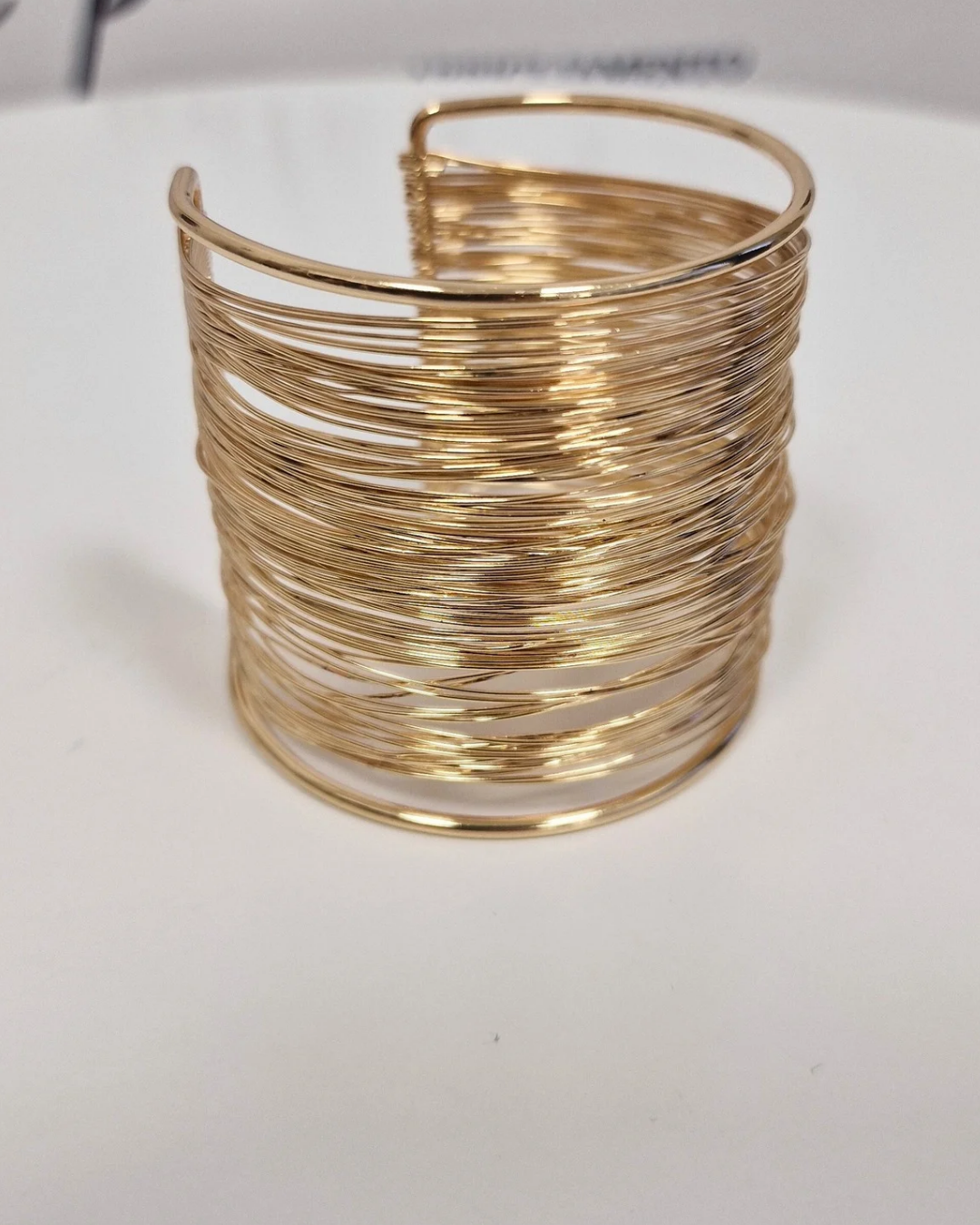 Bracciale oro in paleTTe. abbigliamento