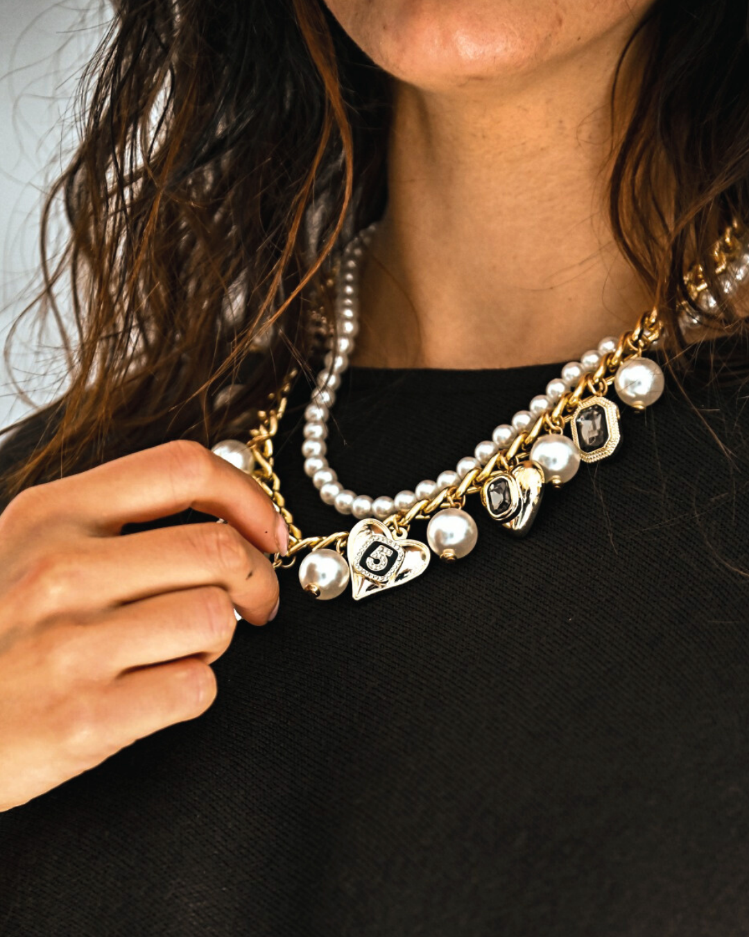 Collana charme in paleTTe. abbigliamento