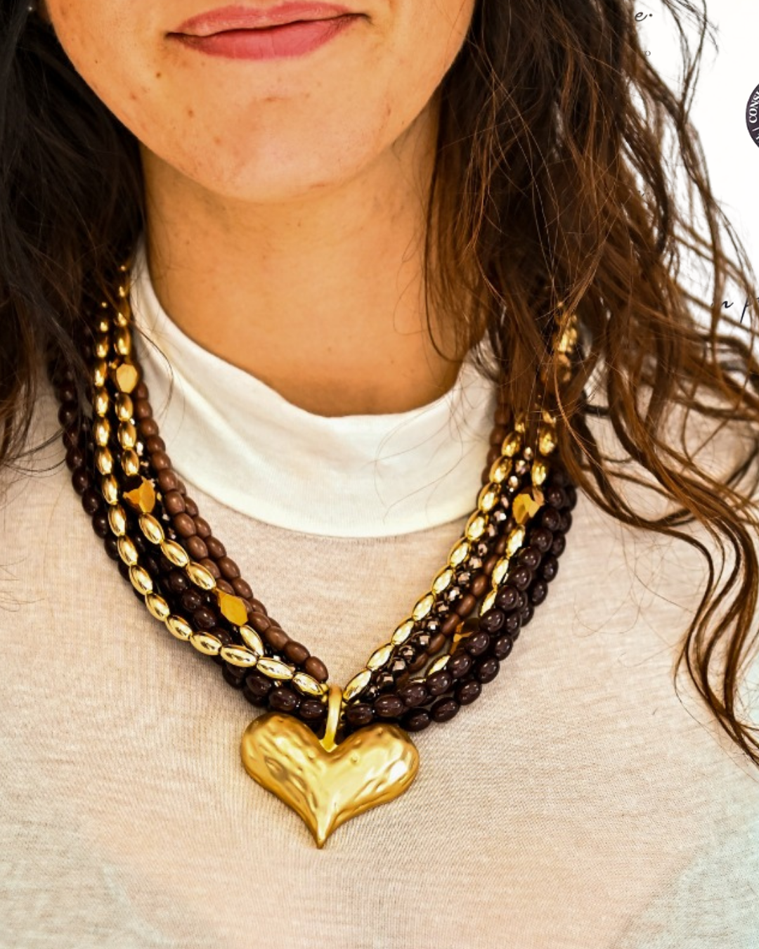 Collana cuore moro in paleTTe. abbigliamento