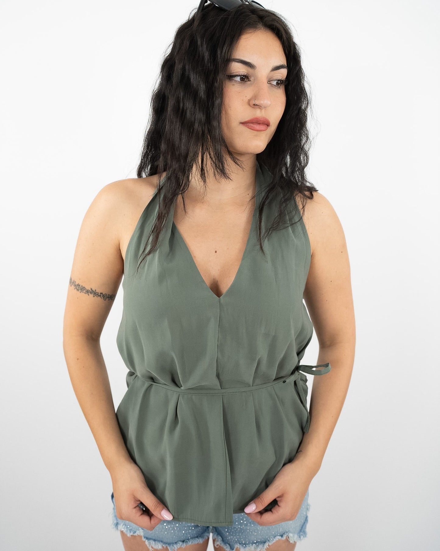 Top verde in paleTTe. abbigliamento