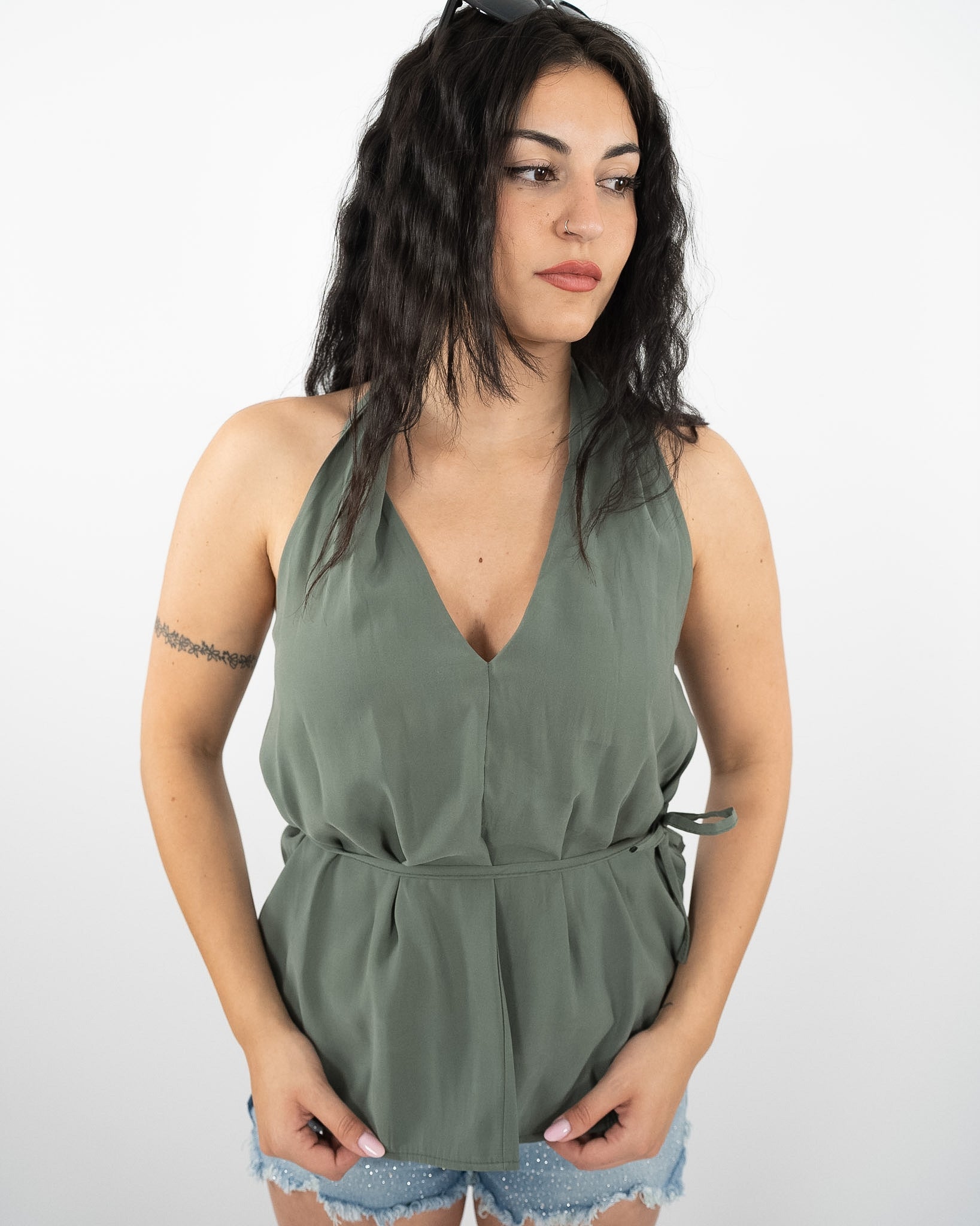 Top verde in paleTTe. abbigliamento