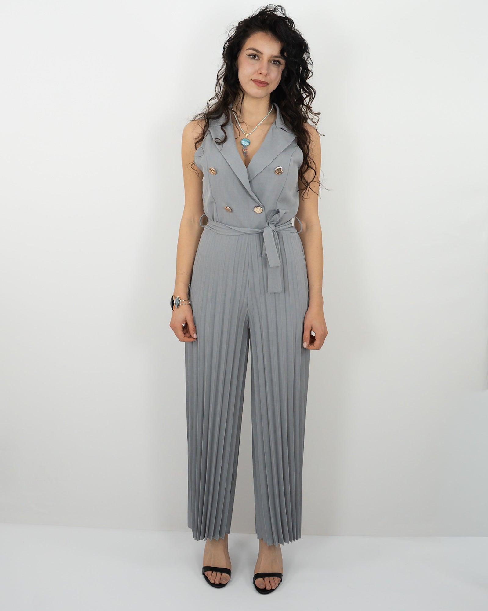 JUMPSUIT ELEGANTE CON GAMBA PLISSÉ in paleTTe. abbigliamento