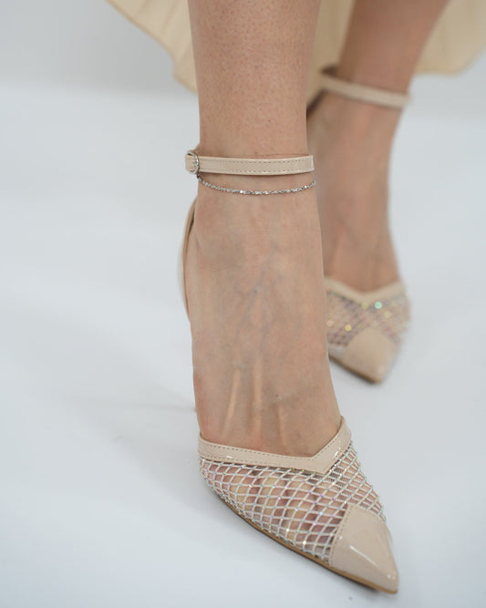 DÉCOLLETÉ BRILLANTINATA in paleTTe. abbigliamento