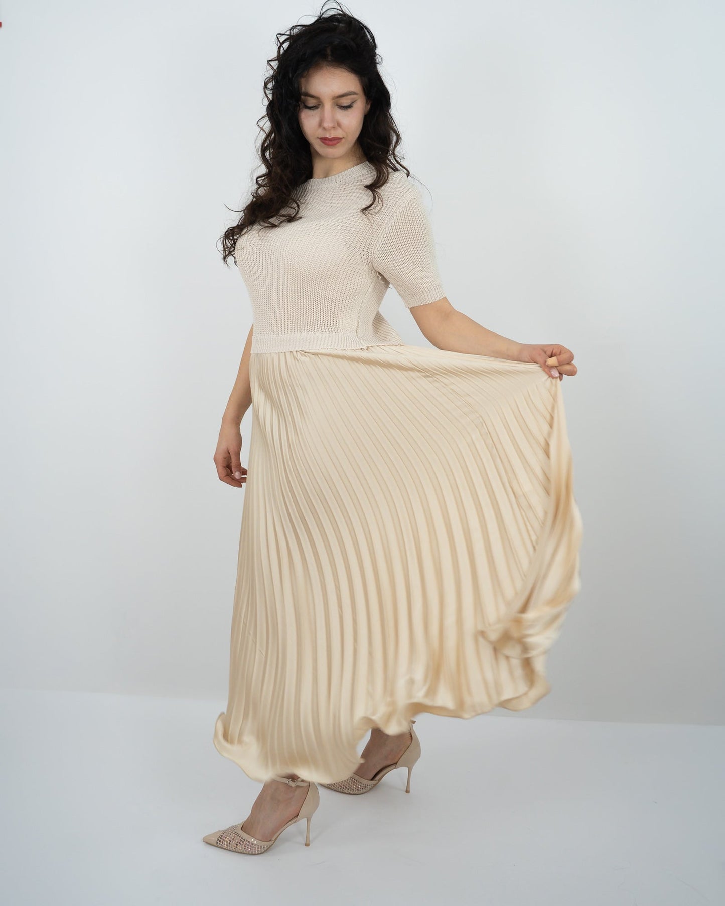 ABITO LUNGO PLISSE' in paleTTe. abbigliamento