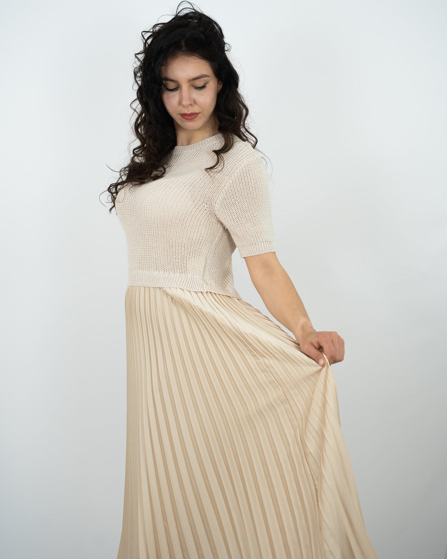 ABITO LUNGO PLISSE' in paleTTe. abbigliamento