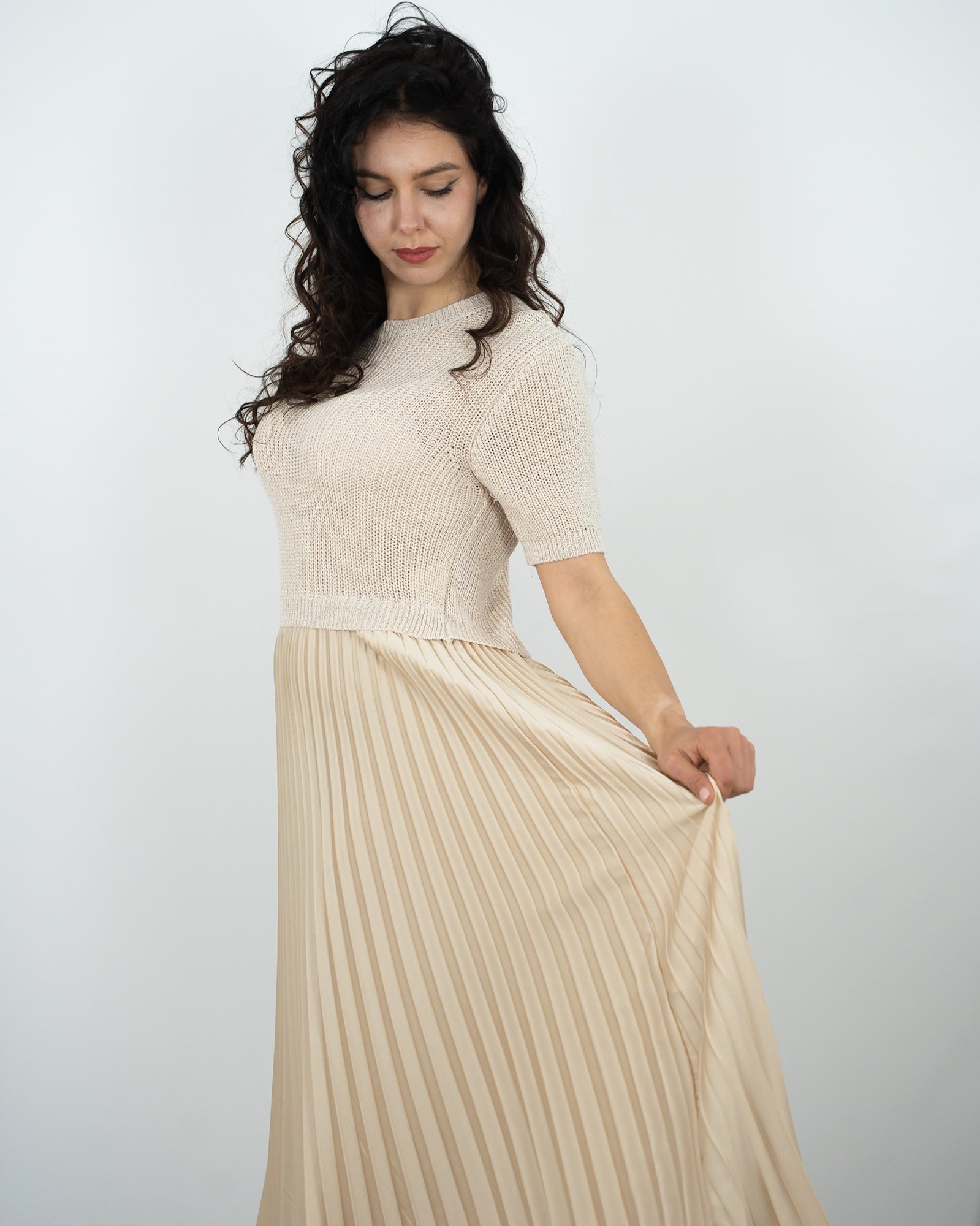 ABITO LUNGO PLISSE' in paleTTe. abbigliamento